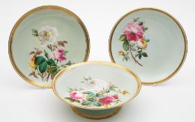 A Minton porcelain botanical part dessert service: each piece finely painted with rose sprays on a