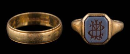 An 18ct gold monogrammed signet ring in closed back setting,