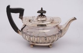 A George V silver teapot, maker Walker & Hall, Sheffield,