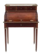 A French mahogany and brass inlaid bureau a cylindre:,