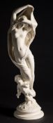 A Robinson and Leadbeater parian figure of Night: holding her cloak of stars over her head,