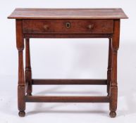 An 18th Century fruitwood rectangular side table:, with an overhanging top,