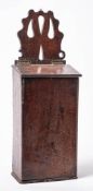 An 18th Century oak candle box: of traditional rectangular outline,