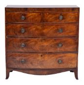 A George IV mahogany and inlaid bow-fronted chest:, bordered with lines,