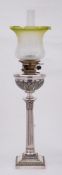 A silver plated Corinthian column oil lamp: the foliate decorated reservoir with Hinks Duplex