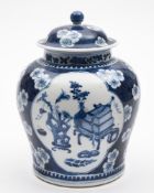 A Chinese blue & white baluster jar & cover: painted with auspicious objects within foliate shaped