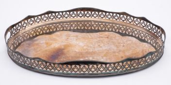 A late Victorian/ Edwardian electro-plated serving tray: of oval outline with pierced and gadrooned