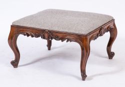 A Victorian carved rosewood stool:, of almost square shape,