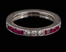 A ruby and diamond eternity ring: set with round, brilliant-cut diamonds and calibre-cut rubies,