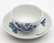 A Meissen porcelain teabowl and saucer: painted in blue in the German Flower pattern with roses,