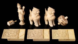 A pair of carved ivory figures of temple guardian dragons,: 6.