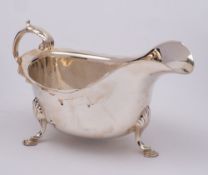 A George V silver sauceboat, maker S Blanckensee & Son Ltd, Birminham, 1934: of traditional design,