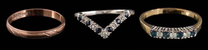 A gold, sapphire and diamond mounted 'wishbone' ring,: a 9ct gold wedding ring,