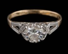 An 18ct gold and diamond single stone-ring: the round, brilliant-cut diamond approximately 6.