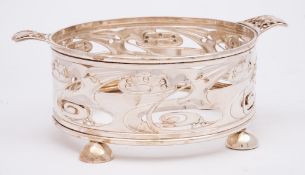 An Art Nouveau period silver twin-handled dish holder, maker Goldsmiths & Silversmiths Co Ltd,