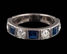 A sapphire and diamond half-hoop ring: set with calibre-cut sapphires and round,