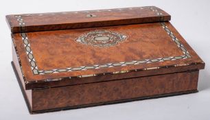 A Victorian amboyna and mother-of-pearl inlaid writing slope: with hinged lid enclosing glass