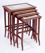 A set of Biedermeier mahogany quartetto tables:,