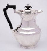 A George V silver hot water jug, maker Atkin Brothers, Sheffield,