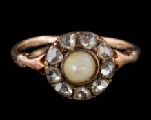 A Georgian gold, pearl and rose diamond surround cluster ring: total diamond weight approximately 0.
