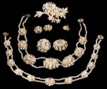 A suite of Victorian seed pearl jewellery: comprising two necklaces with mourning clasps,