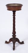 A Victorian carved rosewood circular jardiniere table:,