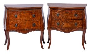 A 19th Century Dutch mahogany and floral marquetry serpentine fronted bombe commode:,