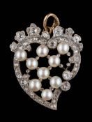 A diamond and seed pearl heart-shaped pendant: set with nine seed pearls within a surround of