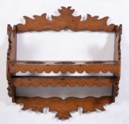 A 19th Century fruitwood wall mounted rack:,