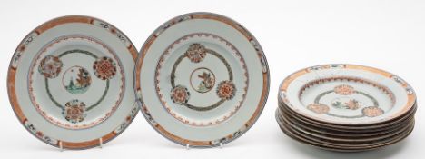 A set of ten Chinese famille verte plates: each painted with a central landscape medallion within