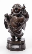 A Japanese bronze Koro and cover: in the form of Hotei, his sack with detachable cover,