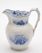 A Minton blue and white pottery Royal Commemorative jug: printed with half-portraits of William IV