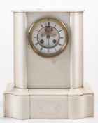 A French white marble Victorian mantel clock with visible escapement: the eight-day duration