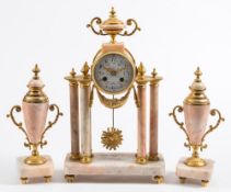 A French Victorian portico marble clock garniture: the eight-day duration movement striking the