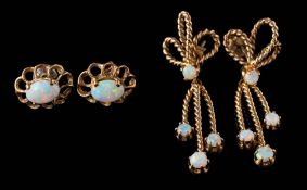 A pair of 9ct gold and opal drop earrings of rope twist design and a pair of opal single-stone ear