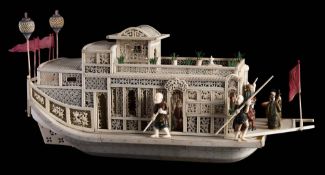 A 19th century Cantonese carved ivory model of a pleasure junk: the pagoda style superstructure