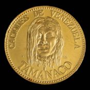 A Venezuelan gold coin: approximately 11.5gms gross weight.