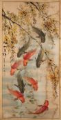 A Chinese scroll painting, signed Wen Ying: depicting the Nine Fish, dated 1993, 130 x 65cm.