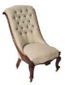A Victorian carved walnut nursing chair:,
