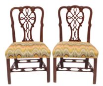 A pair of George III mahogany dining chairs:,