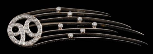 A white metal and diamond-set 90th birthday brooch in the form of Halley's comet: inscription