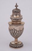 A Victorian silver sugar castor, maker's mark worn, London, 1890: of urn-shaped outline,