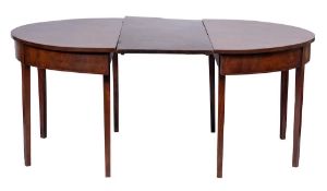 A George III mahogany D-end dining table:,