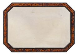 A blonde tortoiseshell and ebonised frame octagonal mirror:,