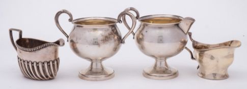 A Sterling silver pedestal cream jug and matching sugar basin,