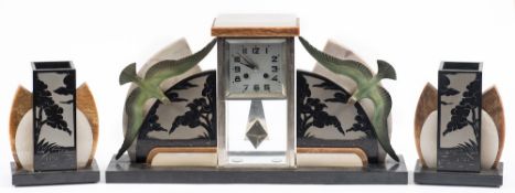 An Art Deco marble clock with seagulls: the eight-day duration movement striking the hours on a