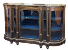 A Victorian ebonised and inlaid credenza:, of D-shaped breakfront outline,