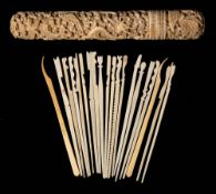 A 19th Cantonese carved ivory bodkin case: of cylindrical outline,