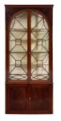 A 19th Century mahogany standing corner display cabinet:, in two sections,