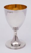 A George III silver goblet, maker Hester Bateman, London, 1787: of plain conical tapering outline,